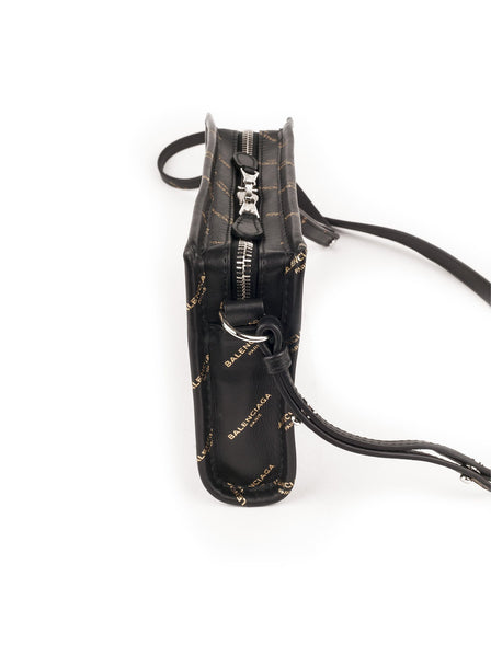 Balenciaga - Bazar All Over Print Pochette Crossbody Bag - Black / Gold - ForwardModa